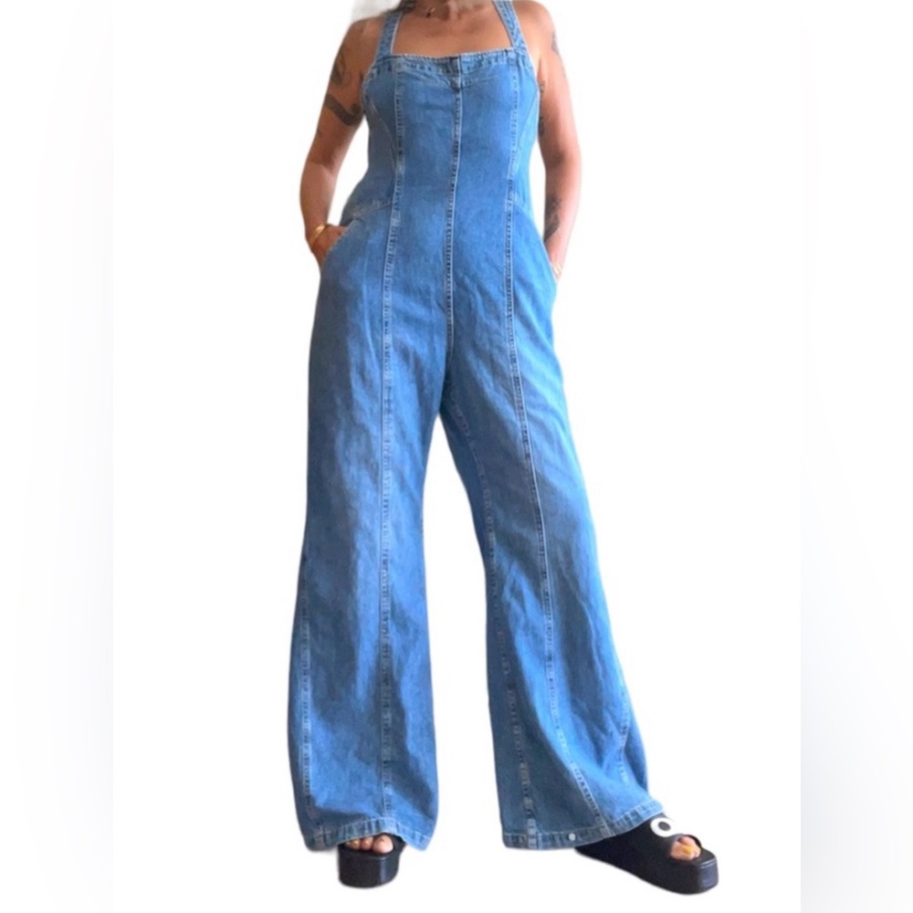Free People Orchhid Blue Wide Leg Tie Back Jumpsuit size small
New with tags